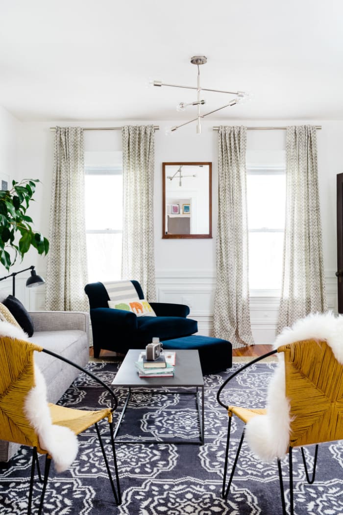 The mid-century modern coffee table in this Boston flat was another Craigslist gem. Photo by Joyelle West for Homepolish, Designed by Shannon Tate