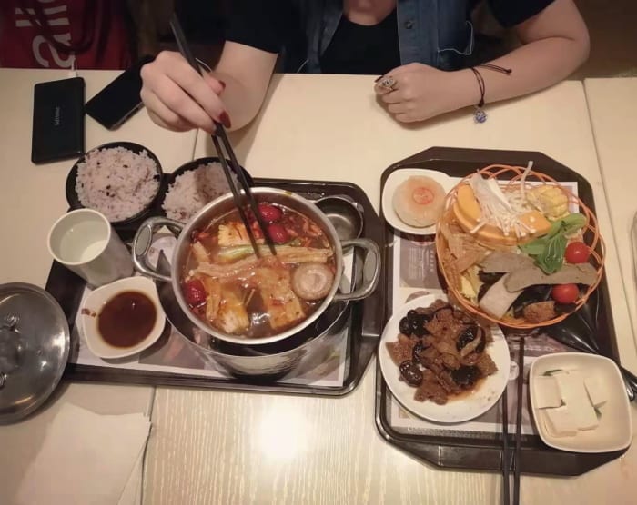 A vegetarian hot pot (a spicy broth to which various ingredients can be added) at a restaurant in Shanghai
