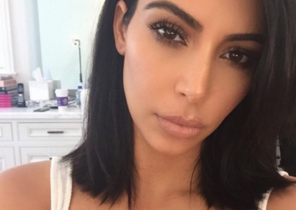 Does Kim Kardashian Really Not Smile Because of Body Shaming? - Verily