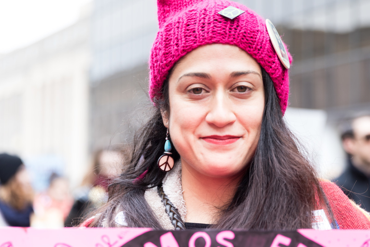 Many marchers donned pink knitted hats as part of a campaign called the Pussyhat Project. Photo courtesy of Stefanie Kamerman